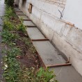 Ремонт отмостки по адресу Уральская 1а в процессе